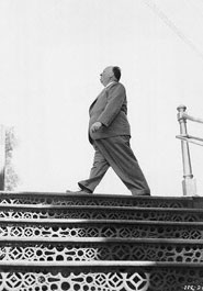 Alfred Hitchcock Walking At Top of Steps<br />
-1950